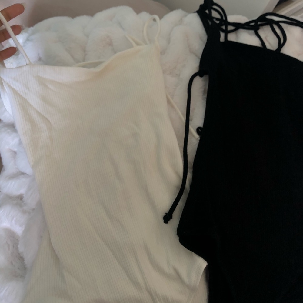 TWO BODYSUITS